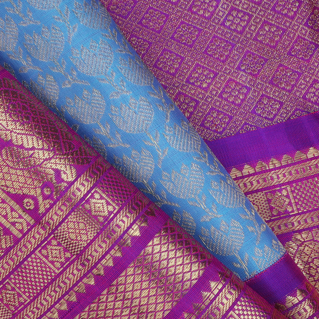 Blue Kanjivaram Silk Saree With Floral Buttis