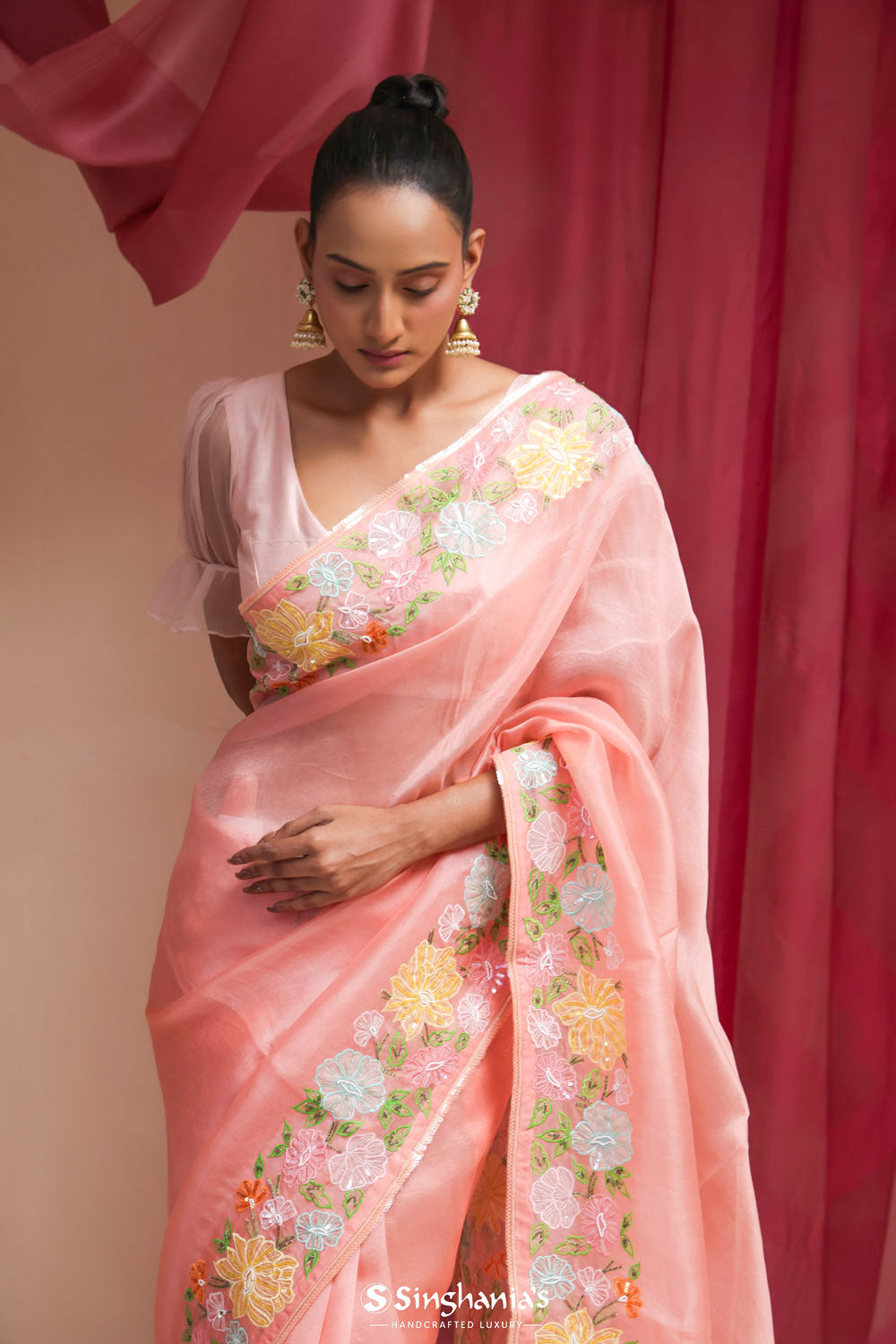 Bright Peach Organza Designer Saree With Floral Embroidery