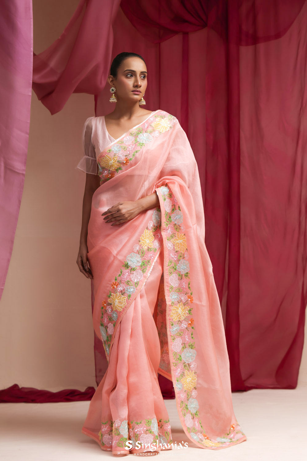 Bright Peach Organza Designer Saree With Floral Embroidery