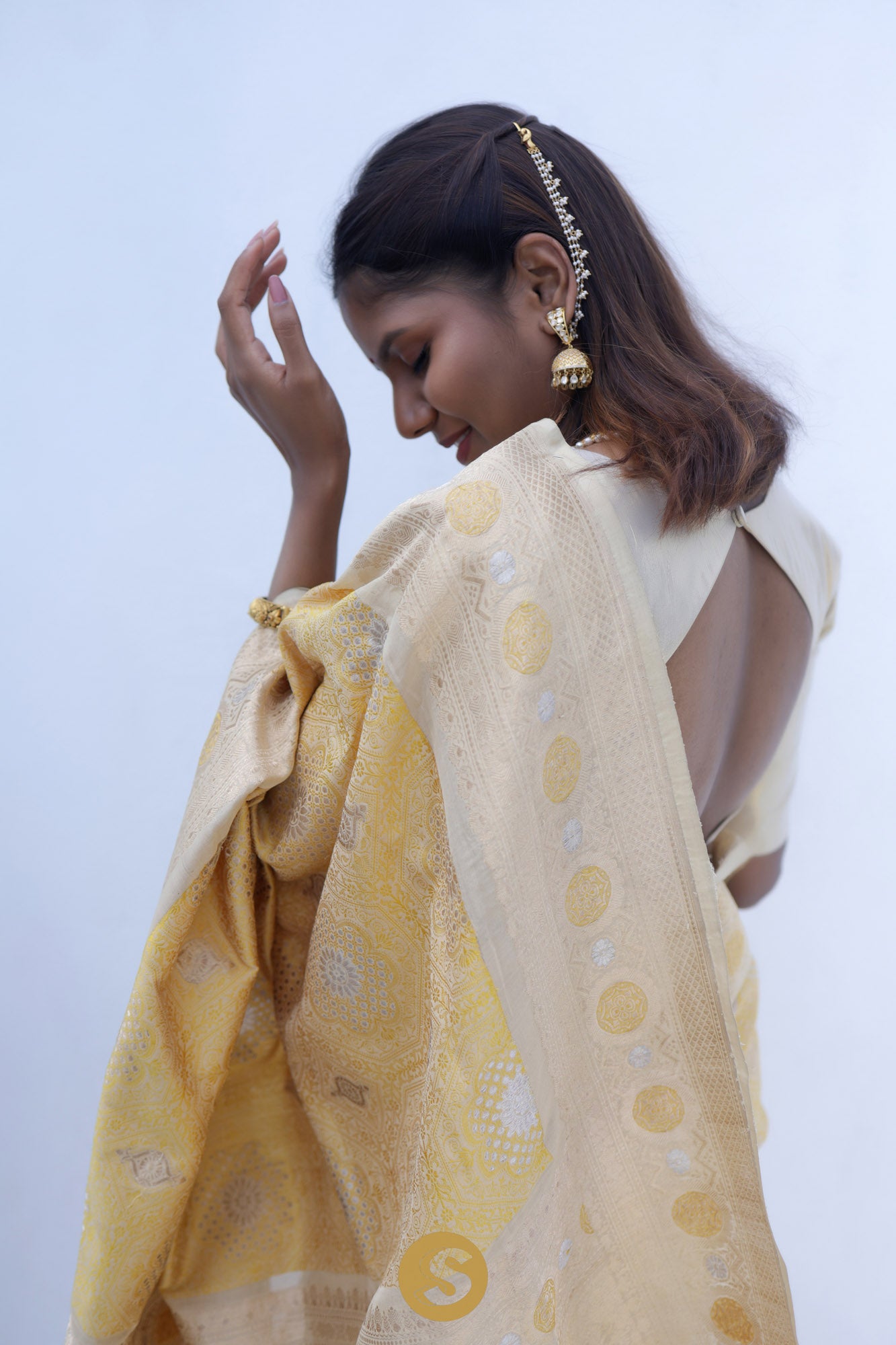 Pastel Yellow Banarasi Silk Saree With Floral Butti Weaving