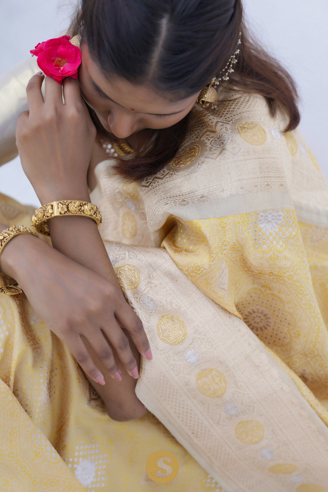 Pastel Yellow Banarasi Silk Saree With Floral Butti Weaving