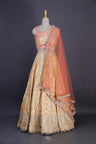 Apricot Peach Silk Lehenga Set With Zari Weaving