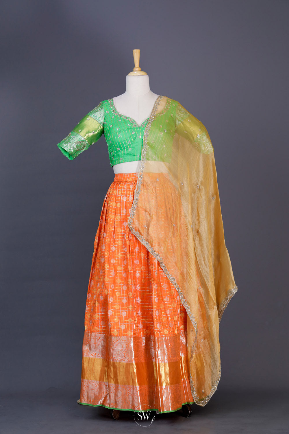 Orange Green Silk Lehenga Set With Zari Weaving