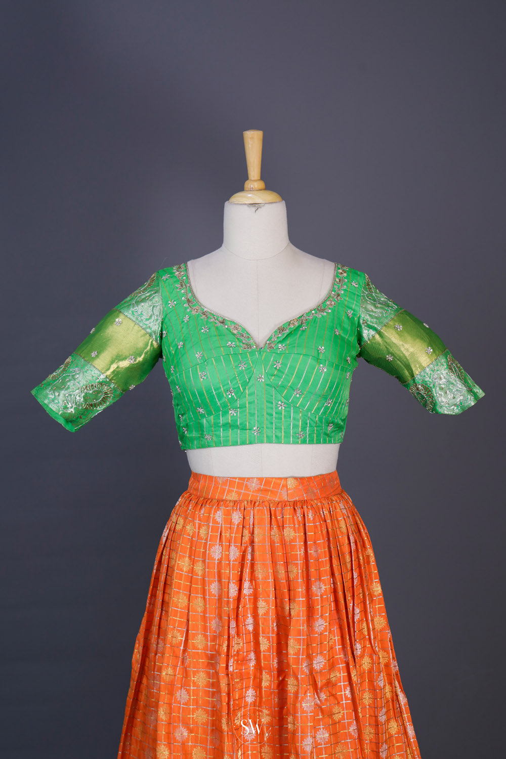 Orange Green Silk Lehenga Set With Zari Weaving