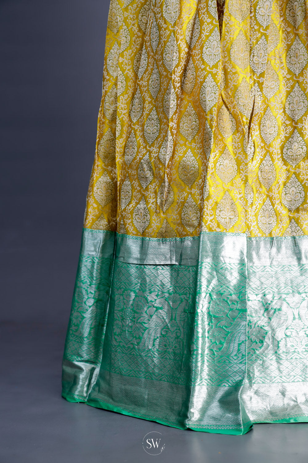 Deep Green-Yellow Silk Lehenga Set With Zari Weaving