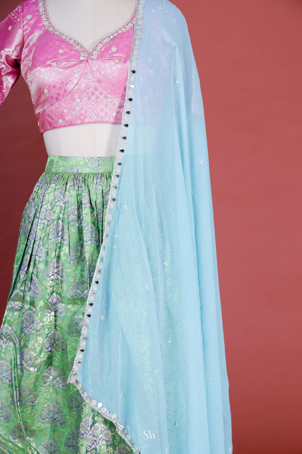 Pastel Green-Pink Silk Lehenga Set With Zari Weaving