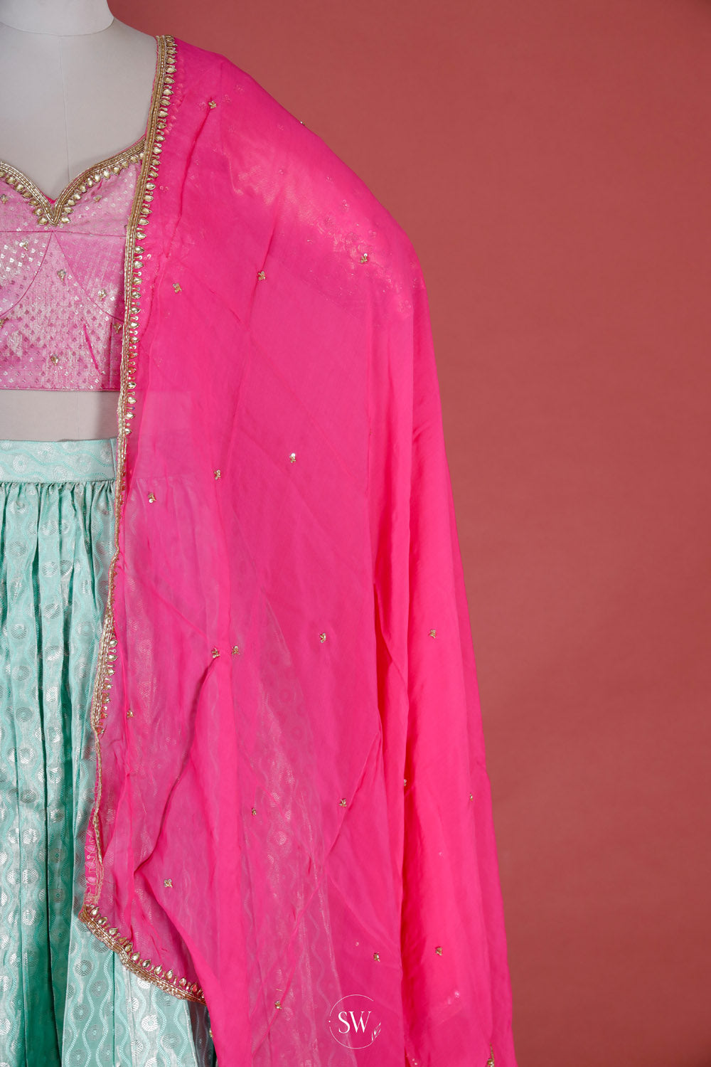Fluorescent Blue-Pink Silk Lehenga Set With Zari Weaving