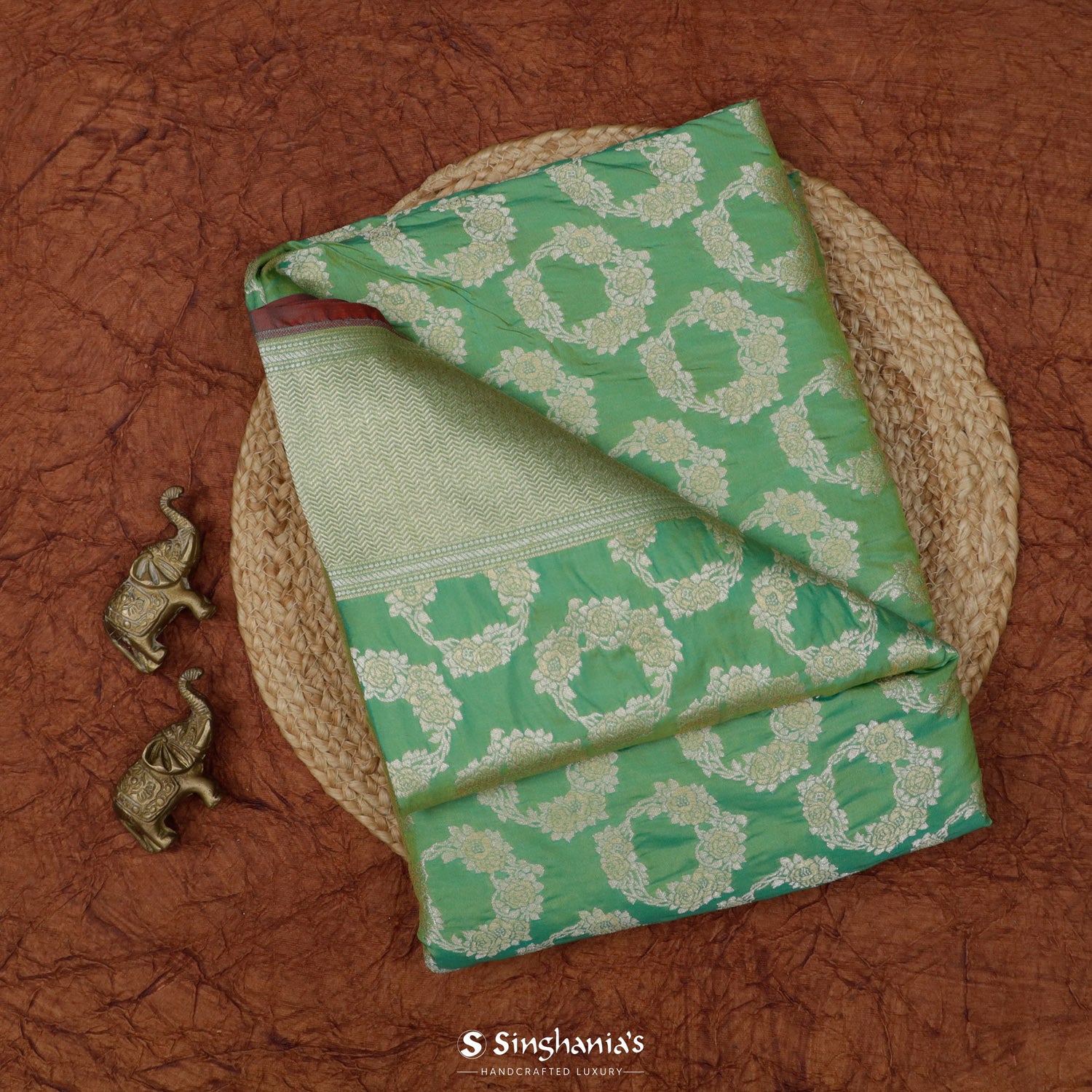 Very Light Malachite Green Banarasi Silk Saree With Floral Buttis Pattern