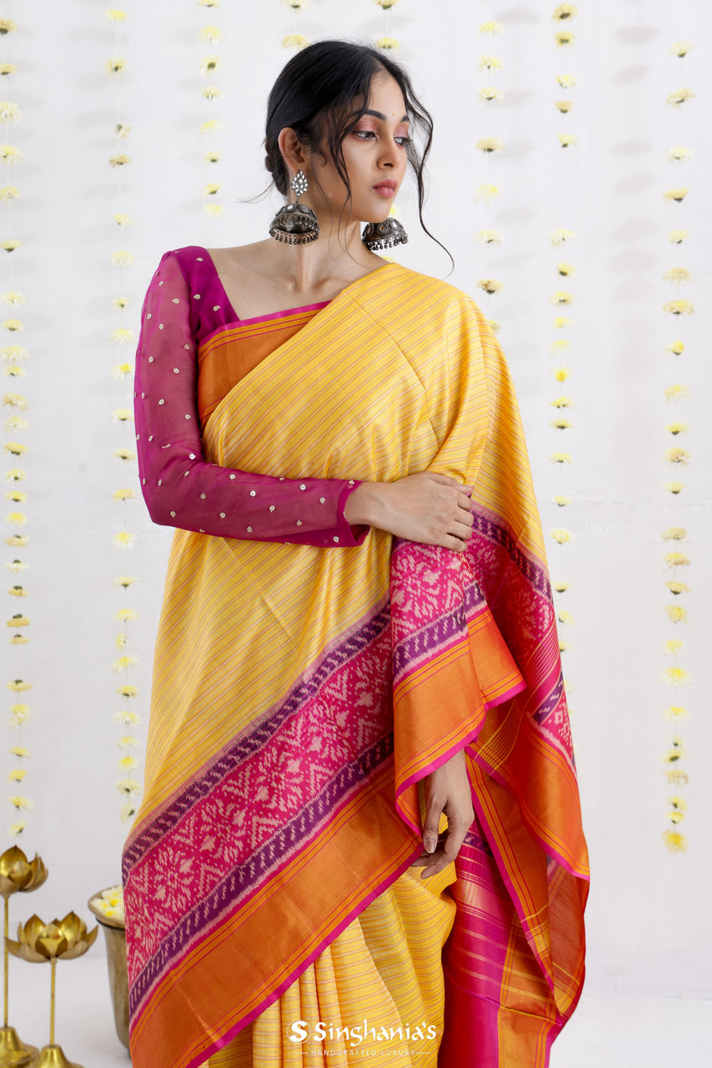 Macaroon Yellow Ikat Patola Silk Saree With Contrast Border