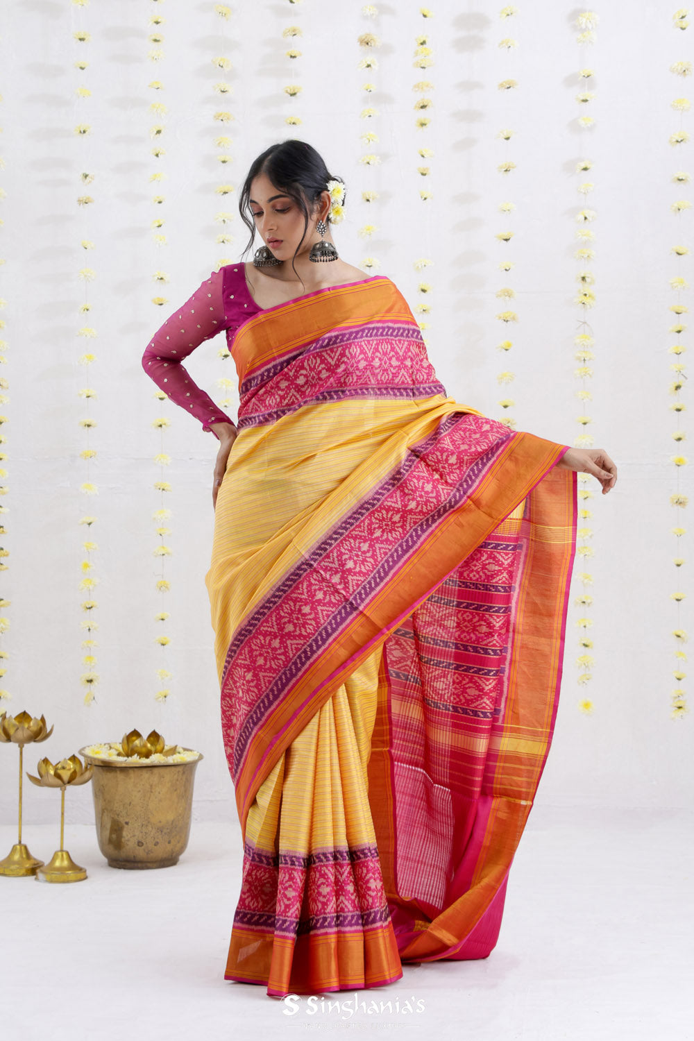 Macaroon Yellow Ikat Patola Silk Saree With Contrast Border