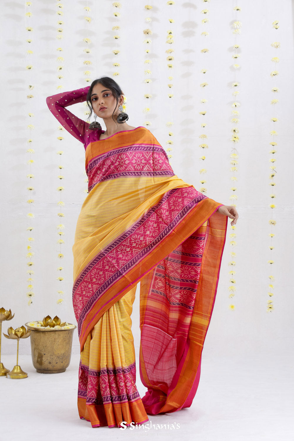 Macaroon Yellow Ikat Patola Silk Saree With Contrast Border