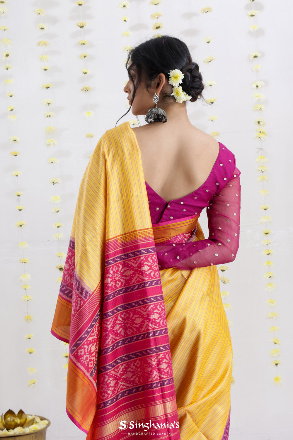 Macaroon Yellow Ikat Patola Silk Saree With Contrast Border