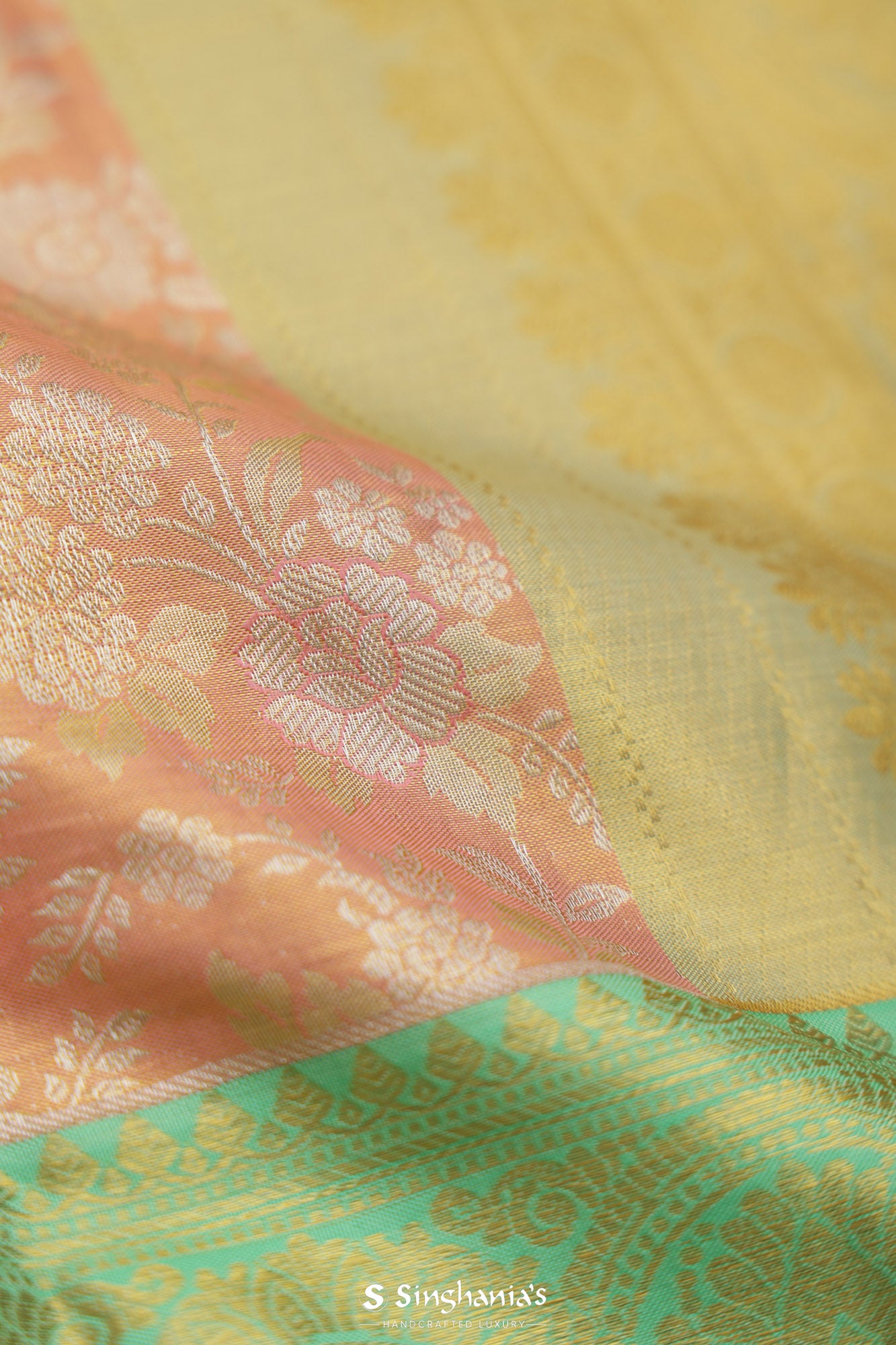 Pastel Peach Tissue Kanjivaram Silk Saree With Floral Jaal Weaving