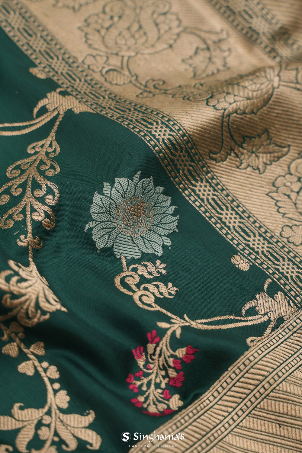 Dark Green Banarasi Silk Saree With Geometric And Floral Patterns