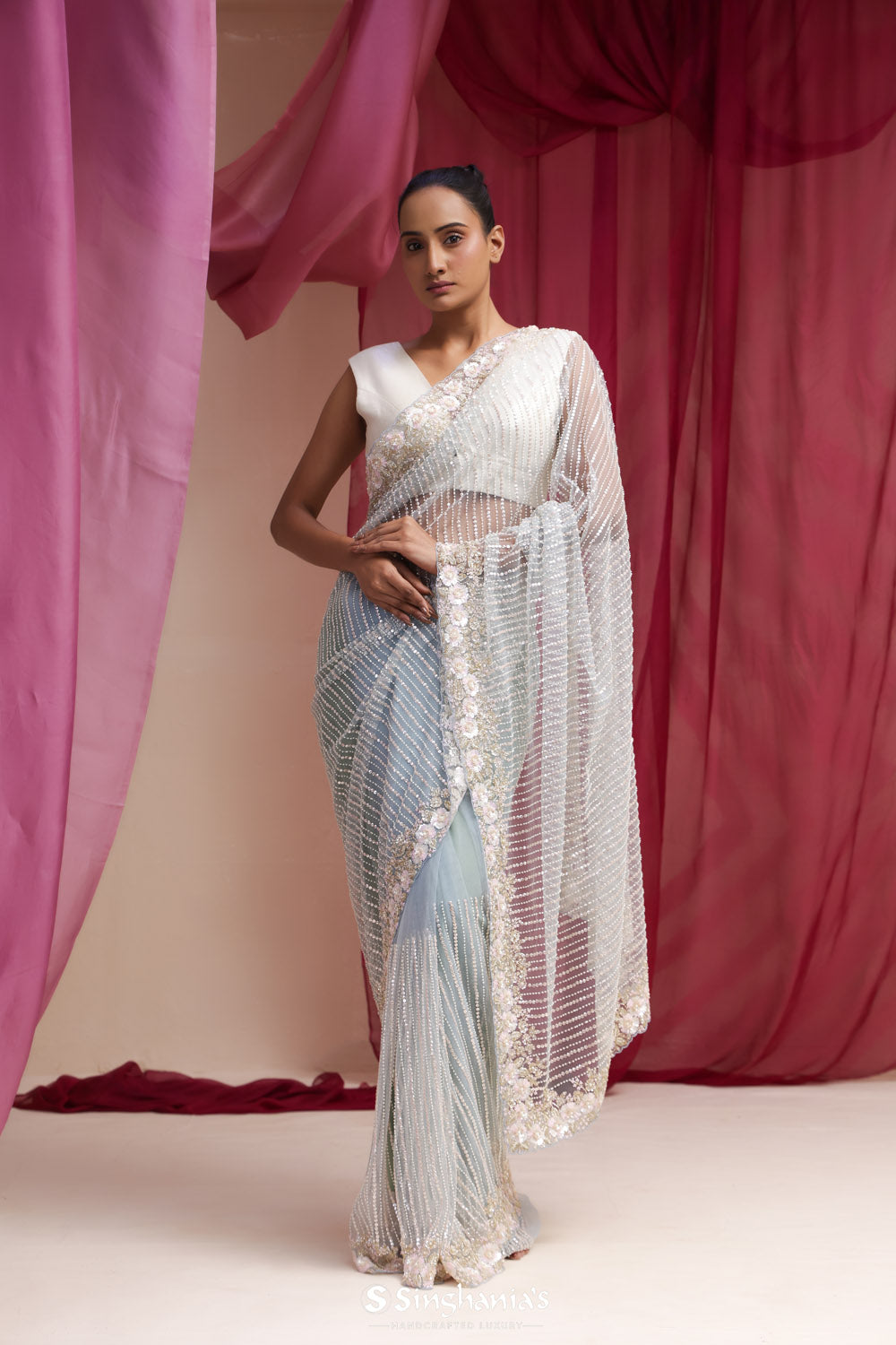 Ice Blue Net Designer Saree With Hand Embroidery