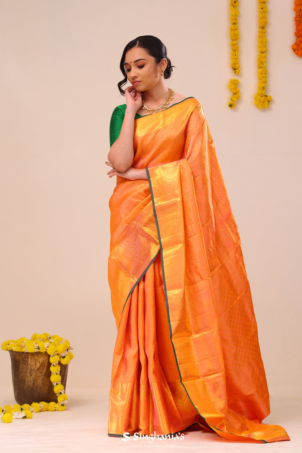 Bright Peach Jaali Kanjivaram Silk Saree