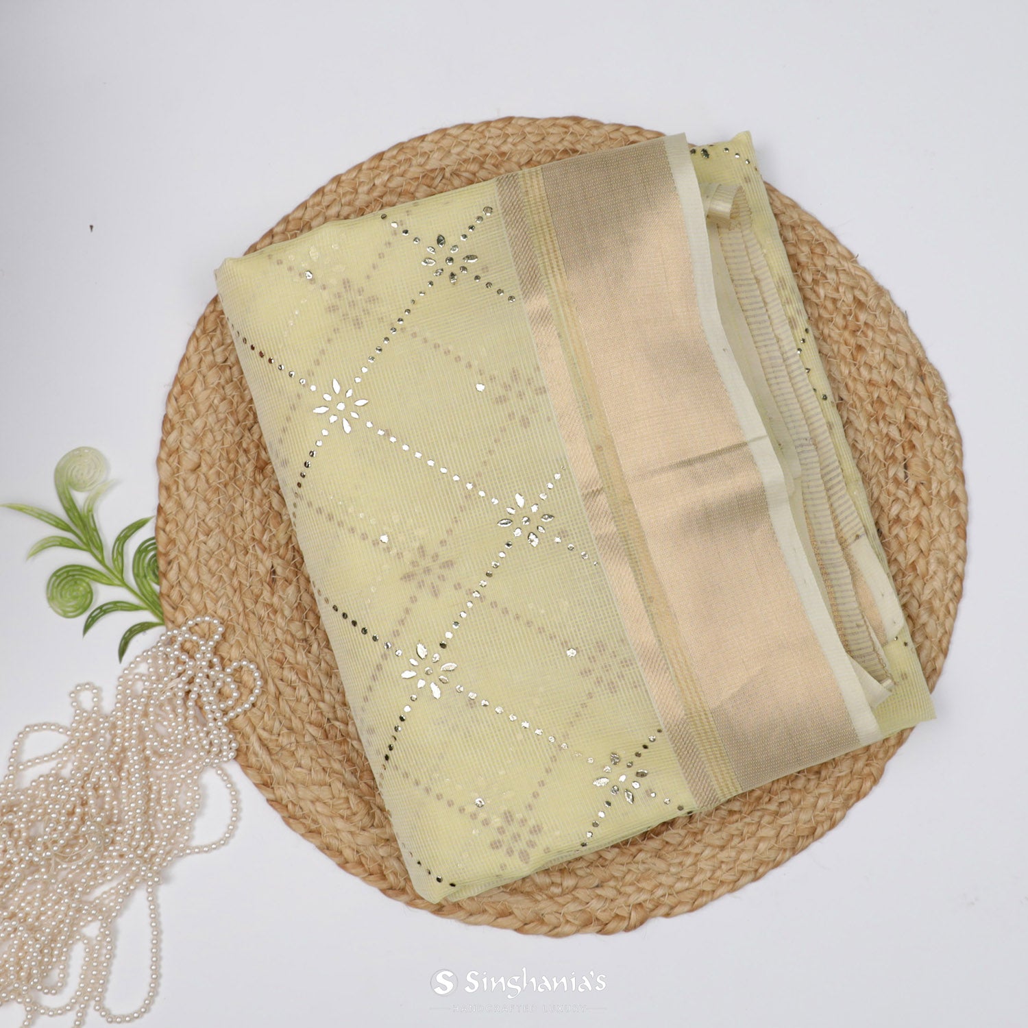 Light Yellow Kota Silk Saree With Mukaish Work In Floral Geometrical Pattern