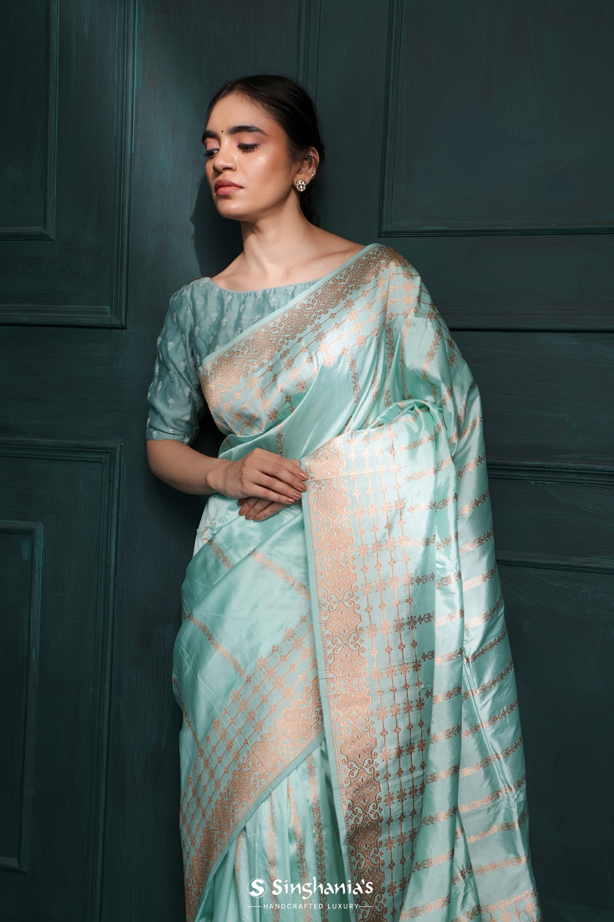 Light Turquoise Blue Banarasi Silk Saree With Floral Stripes Weaving