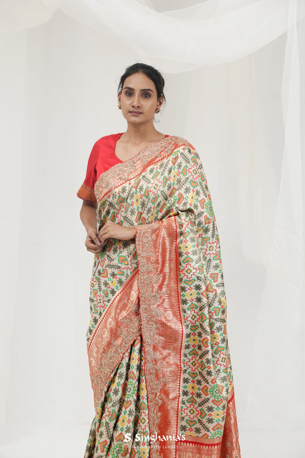 Pale Pista Green Kanjivaram Silk Saree With Ikat Patola Weaving