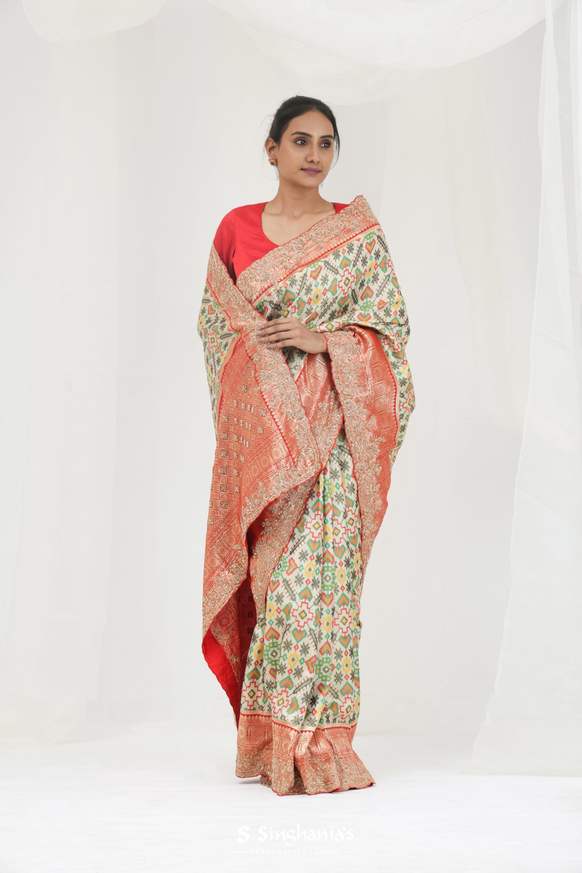 Pale Pista Green Kanjivaram Silk Saree With Ikat Patola Weaving