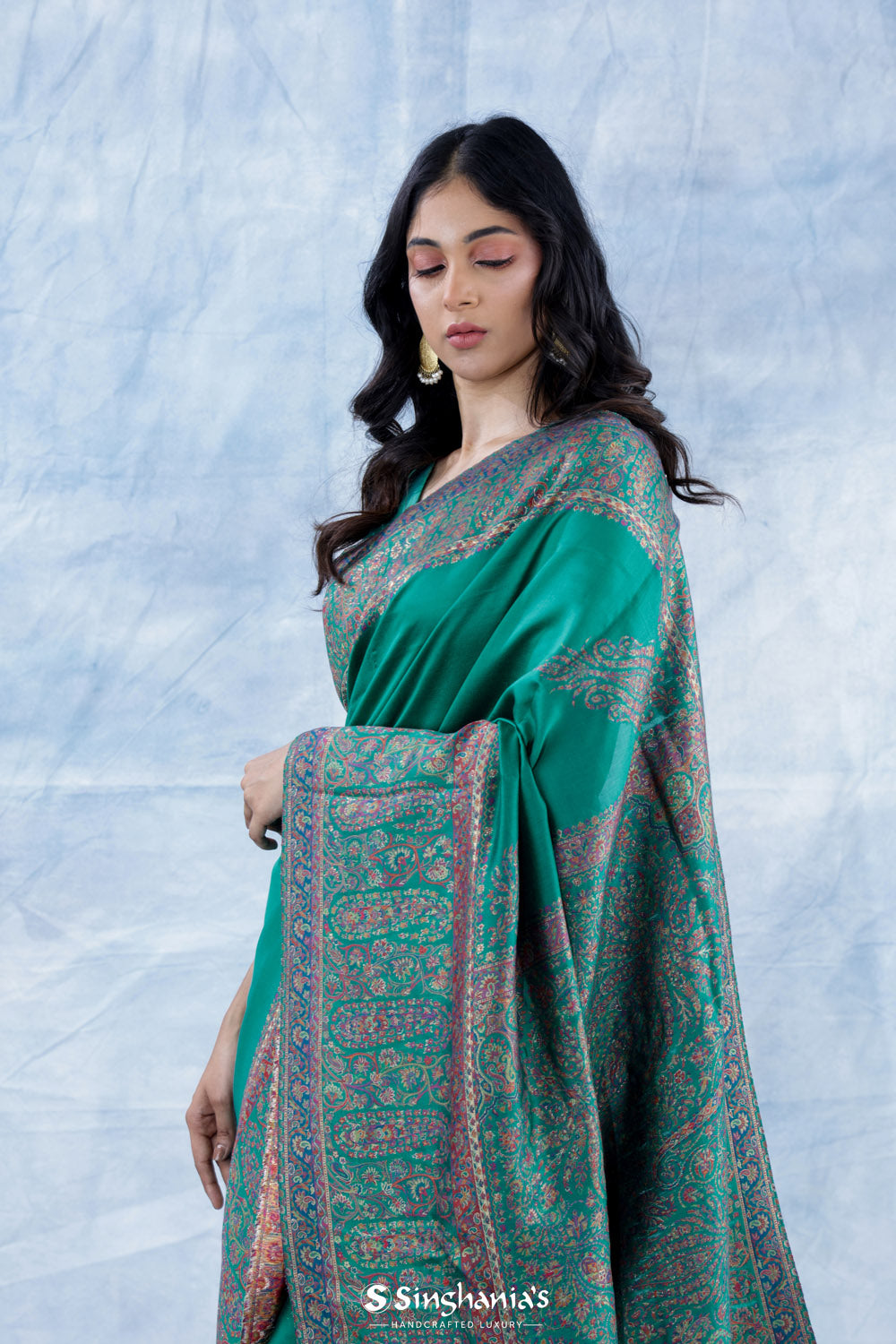 Dark Turquoise Blue Kani Handloom Saree With Floral Motifs