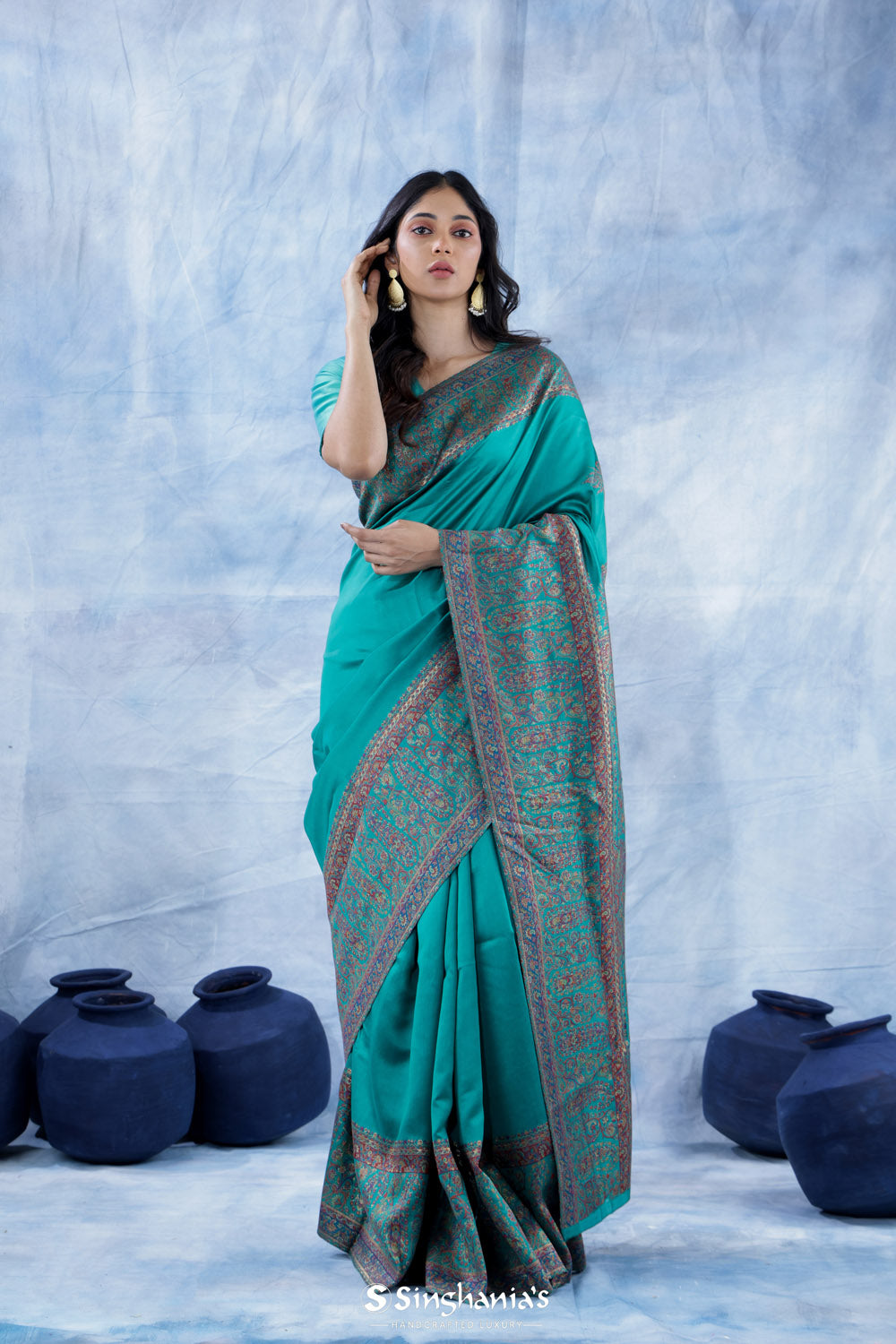 Dark Turquoise Blue Kani Handloom Saree With Floral Motifs