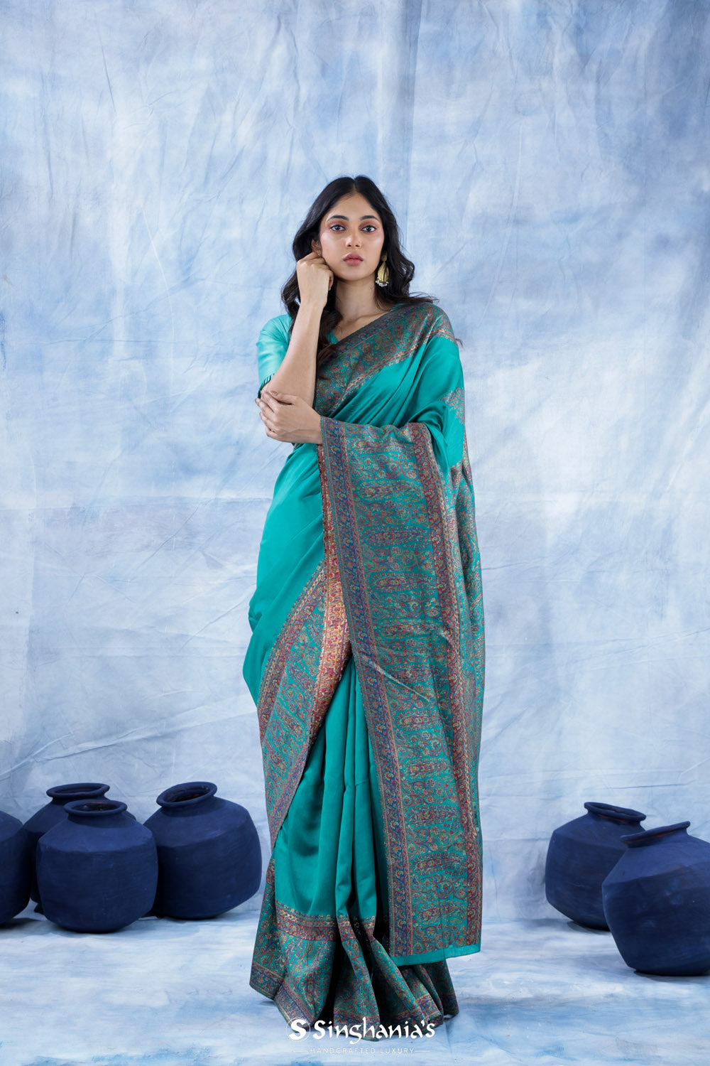 Dark Turquoise Blue Kani Handloom Saree With Floral Motifs