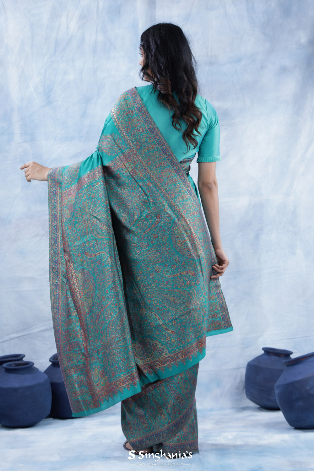 Dark Turquoise Blue Kani Handloom Saree With Floral Motifs