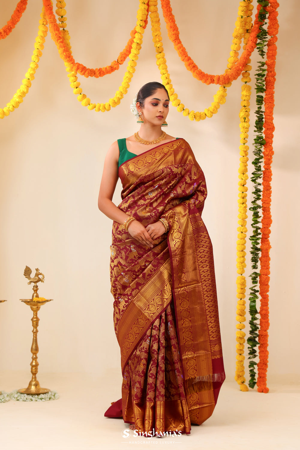 Deep Maroon Kanjivaram Silk Saree With Floral Fauna Weaving