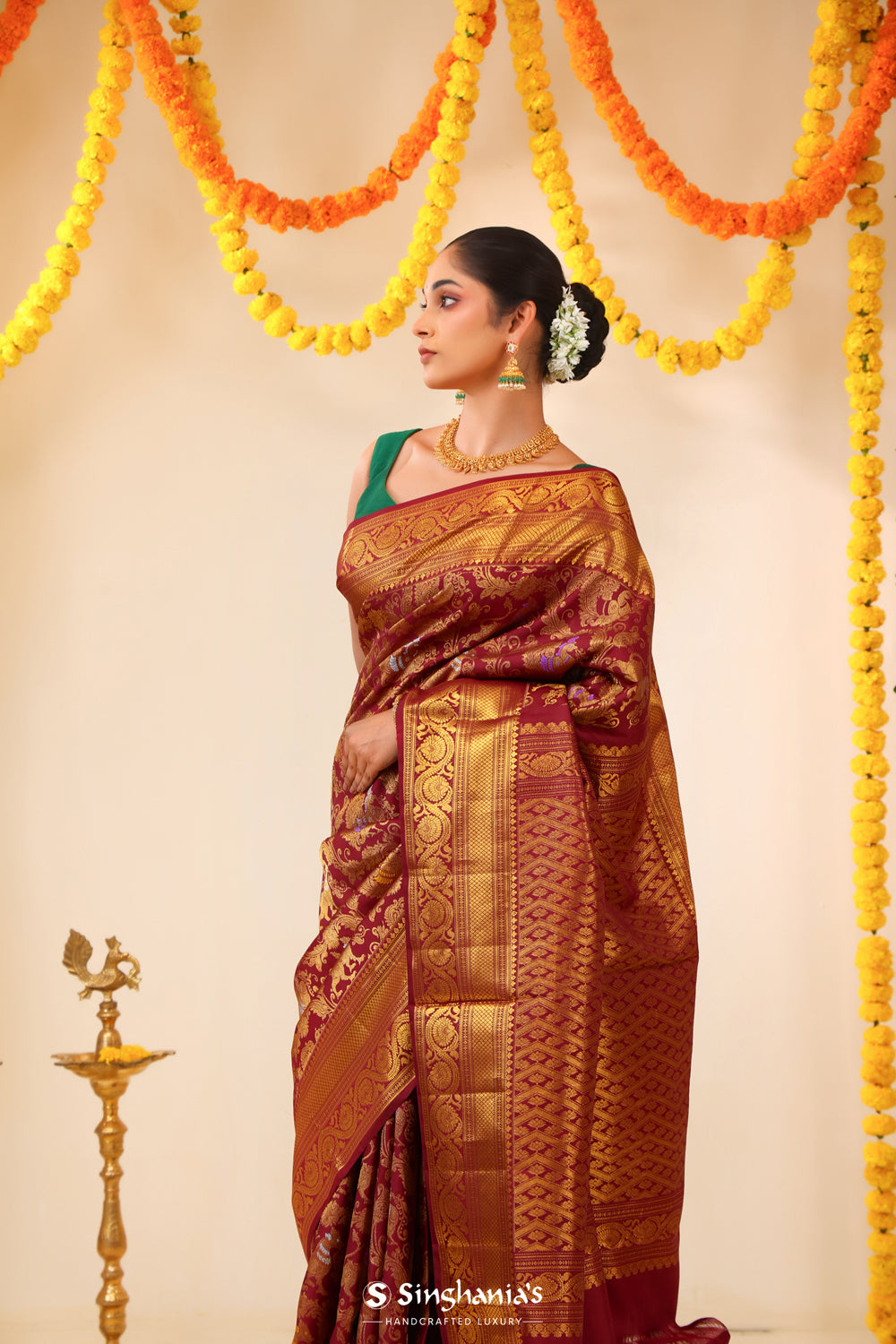 Deep Maroon Kanjivaram Silk Saree With Floral Fauna Weaving