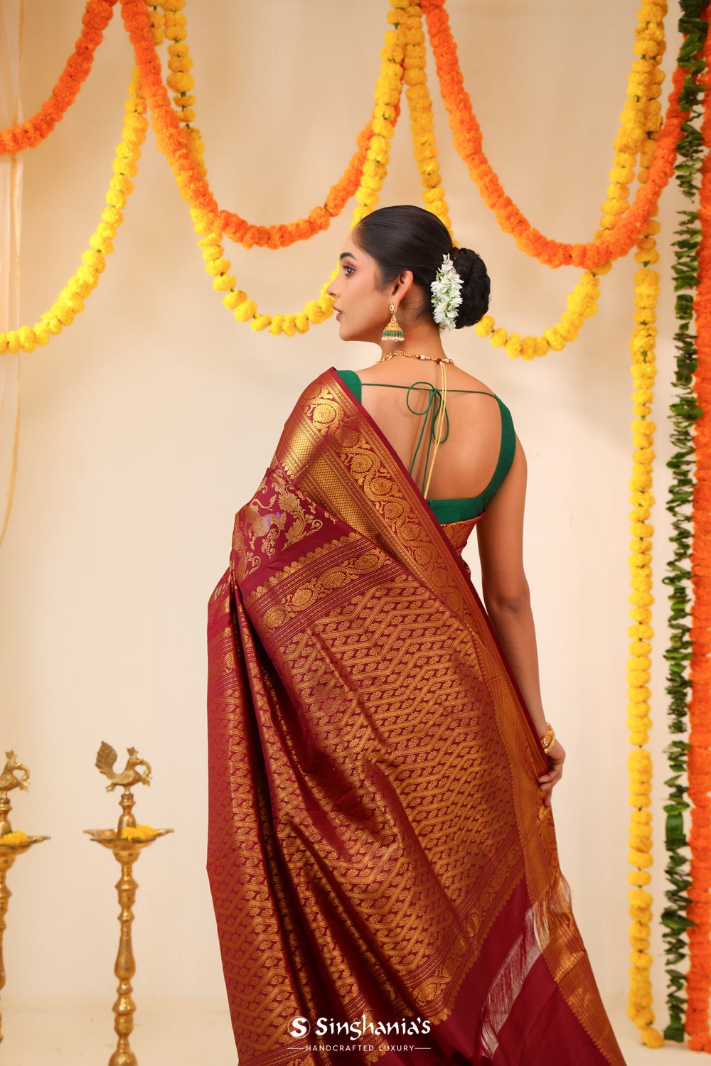 Deep Maroon Kanjivaram Silk Saree With Floral Fauna Weaving