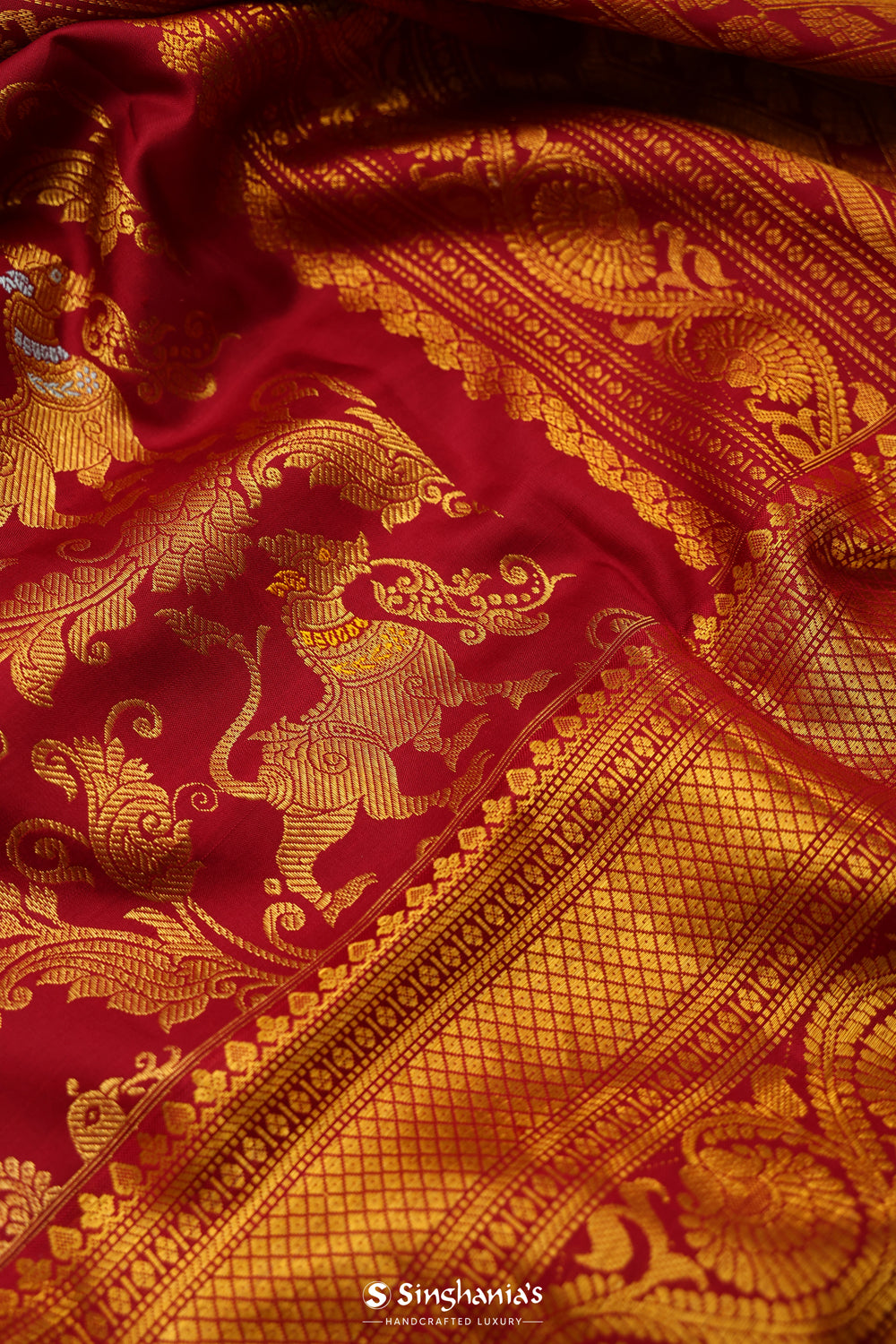 Deep Maroon Kanjivaram Silk Saree With Floral Fauna Weaving