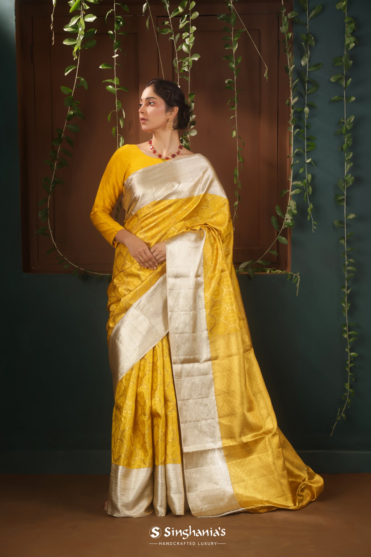 Gold Silver Tissue Saree With Floral Geometrical Pattern