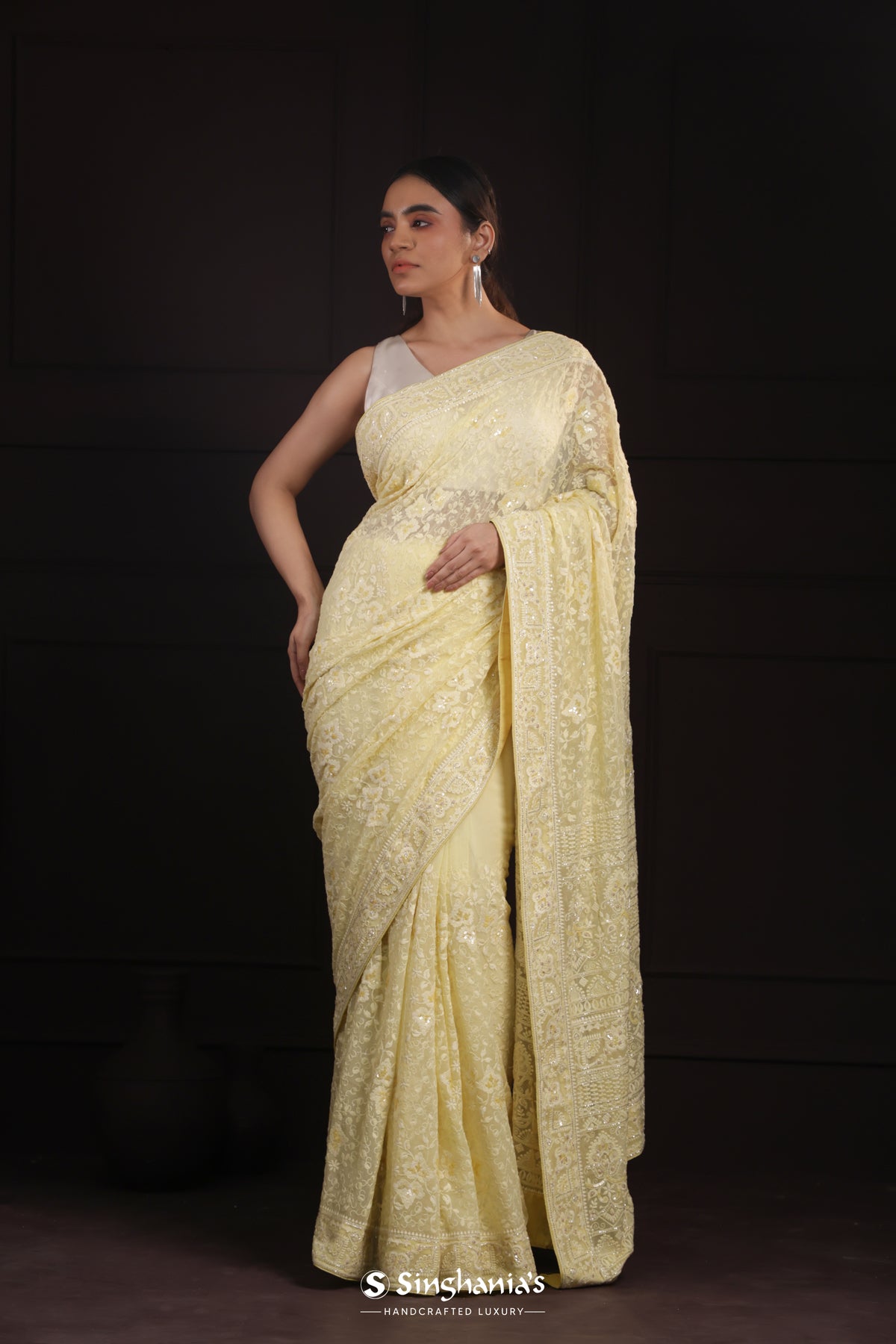 Light Khaki Yellow Georgette Saree With Hand Embroidery