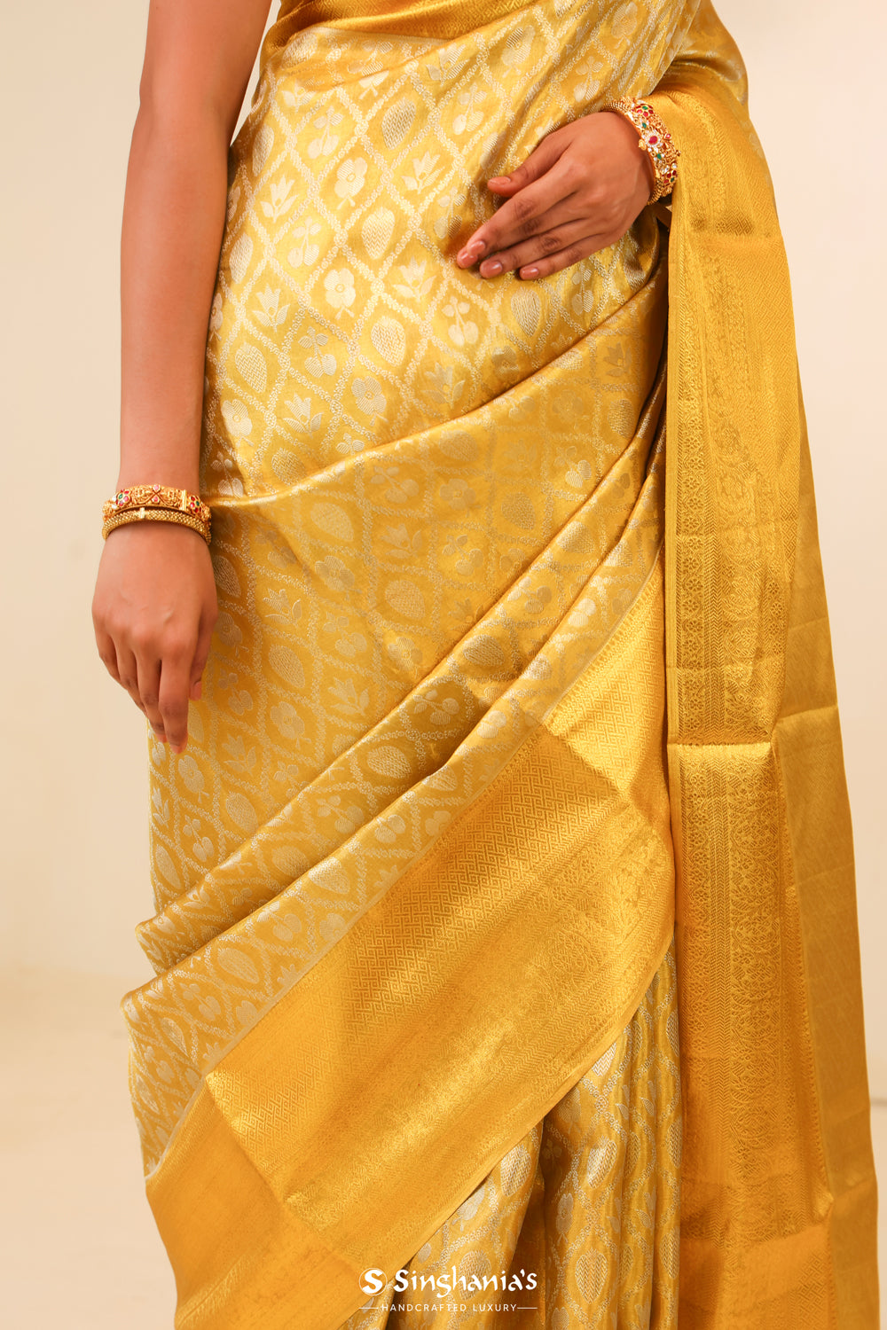 Pastel Gold Tissue Kanjivaram Saree With Floral Butta Weaving