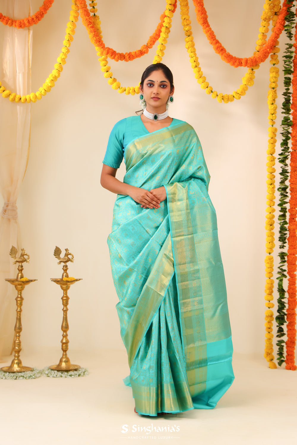 Aqua Blue Kanjivaram Silk Saree With Floral-Fauna Weaving