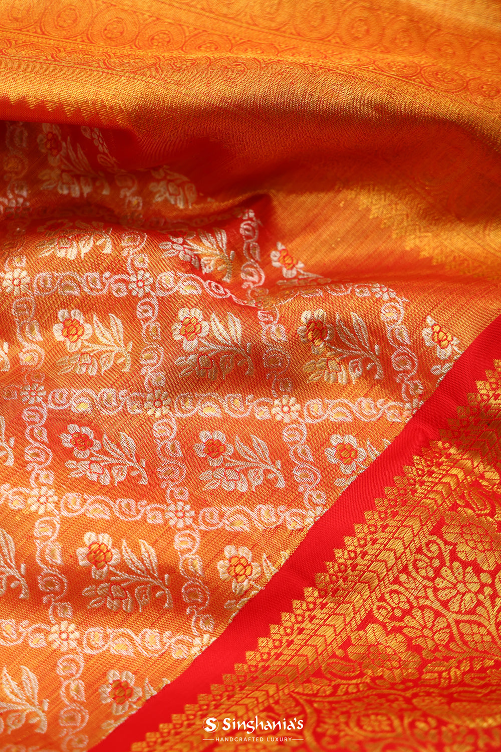 Metallic Orange Tissue Kanjivaram Saree With Floral Weaving