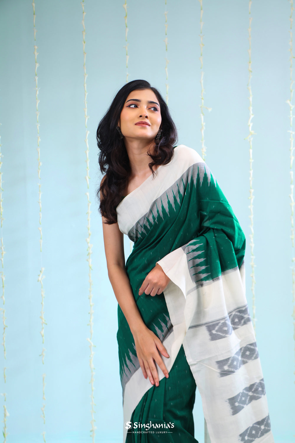 Bottle Green Ikkat Cotton Saree With Contrast Border