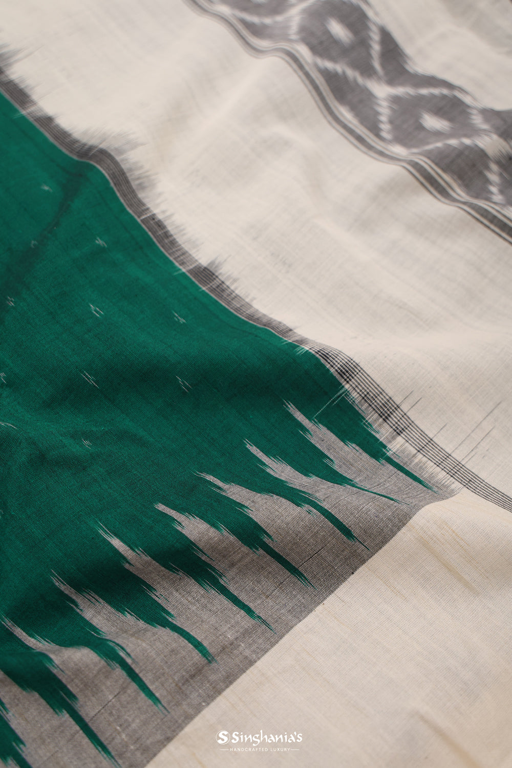 Bottle Green Ikkat Cotton Saree With Contrast Border