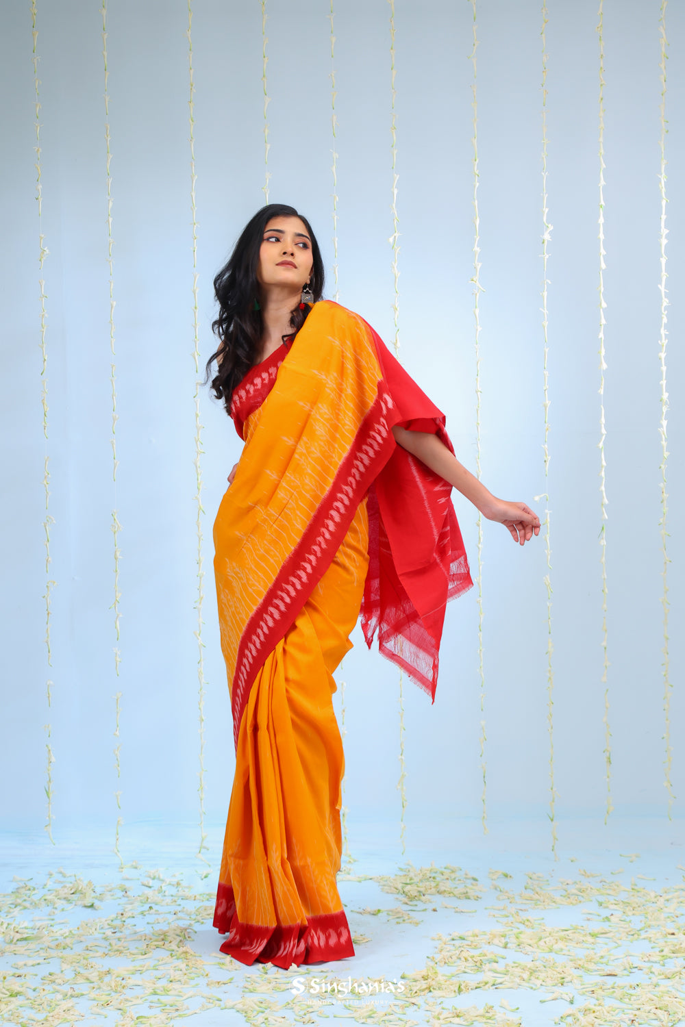 Marigold Orange Ikkat Cotton Saree With Contrast Border