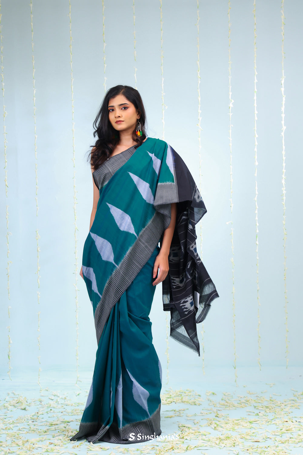 Peacock Blue Ikkat Cotton Saree With Contrast Border