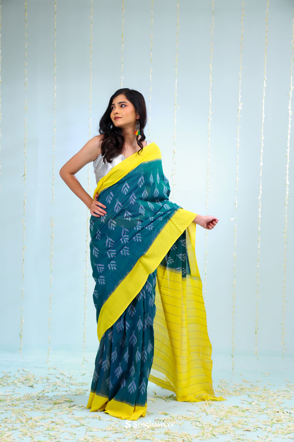 Peacock Green Ikkat Cotton Saree With Contrast Border