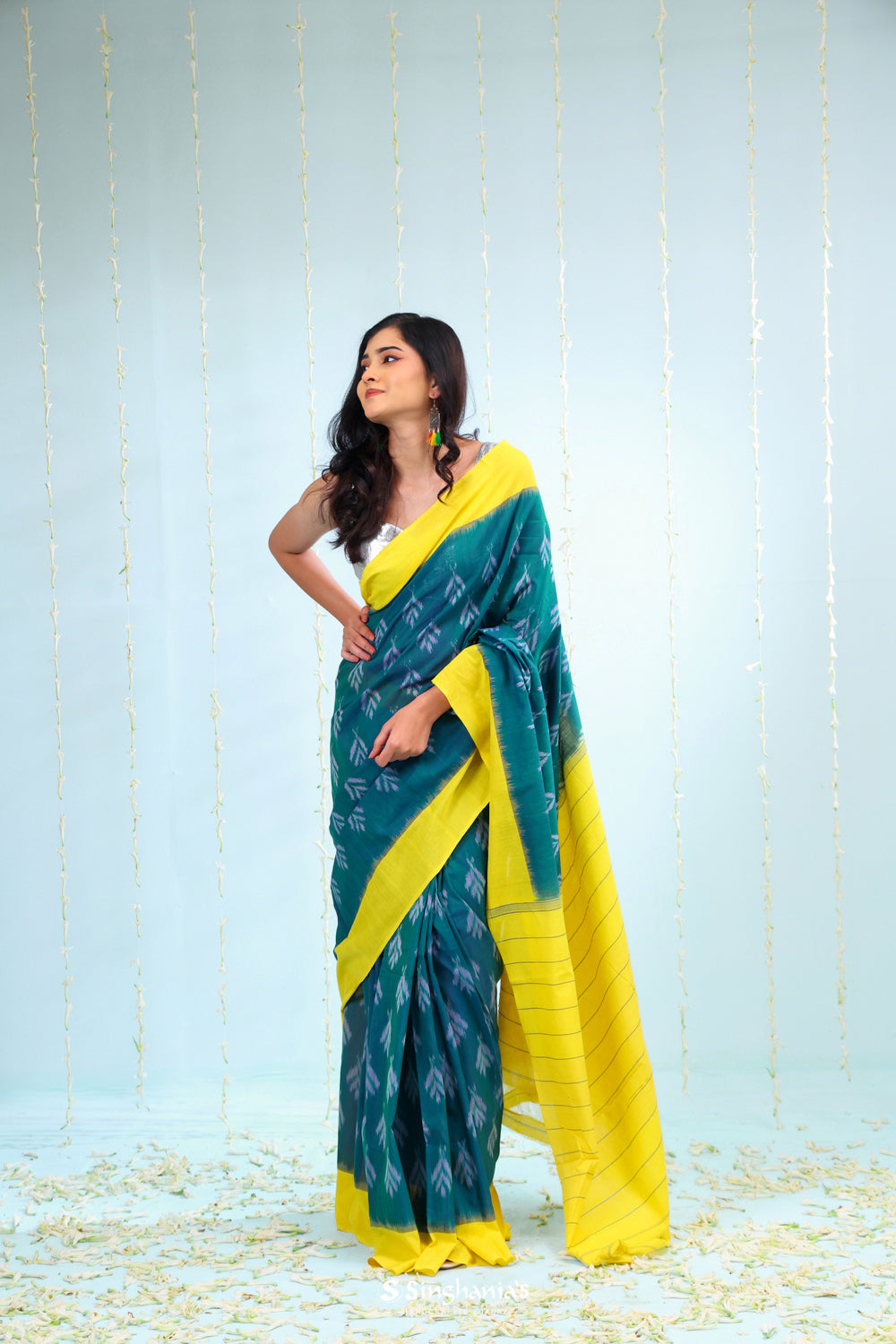 Peacock Green Ikkat Cotton Saree With Contrast Border