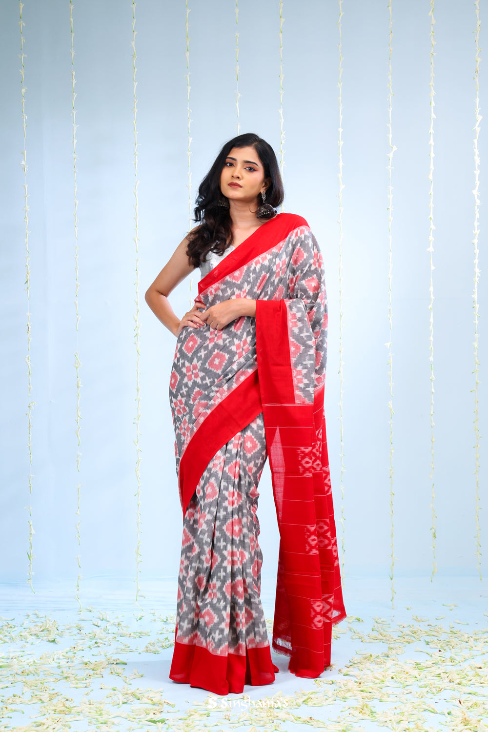 Abbey Black Ikkat Cotton Saree With Contrast Border