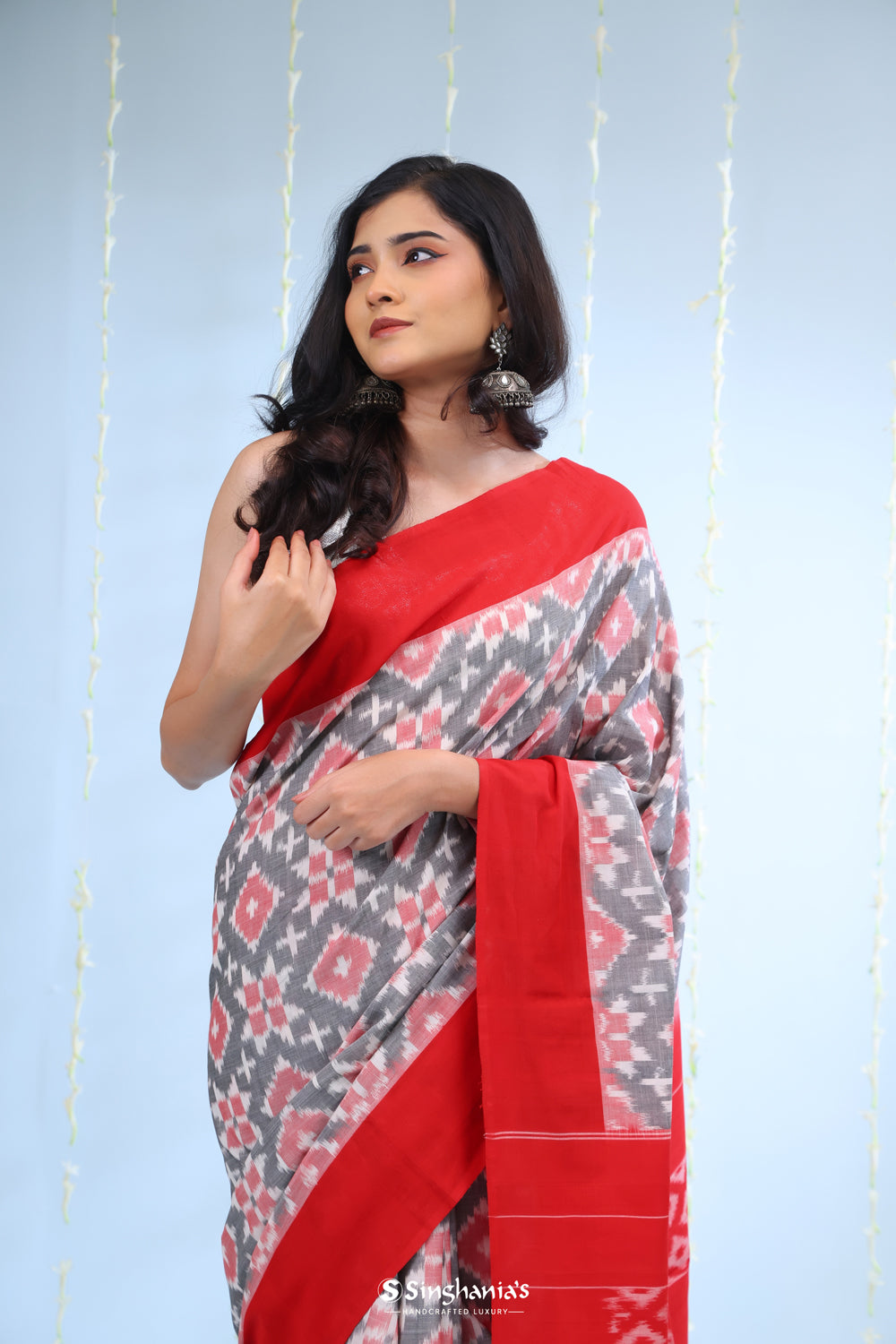 Abbey Black Ikkat Cotton Saree With Contrast Border