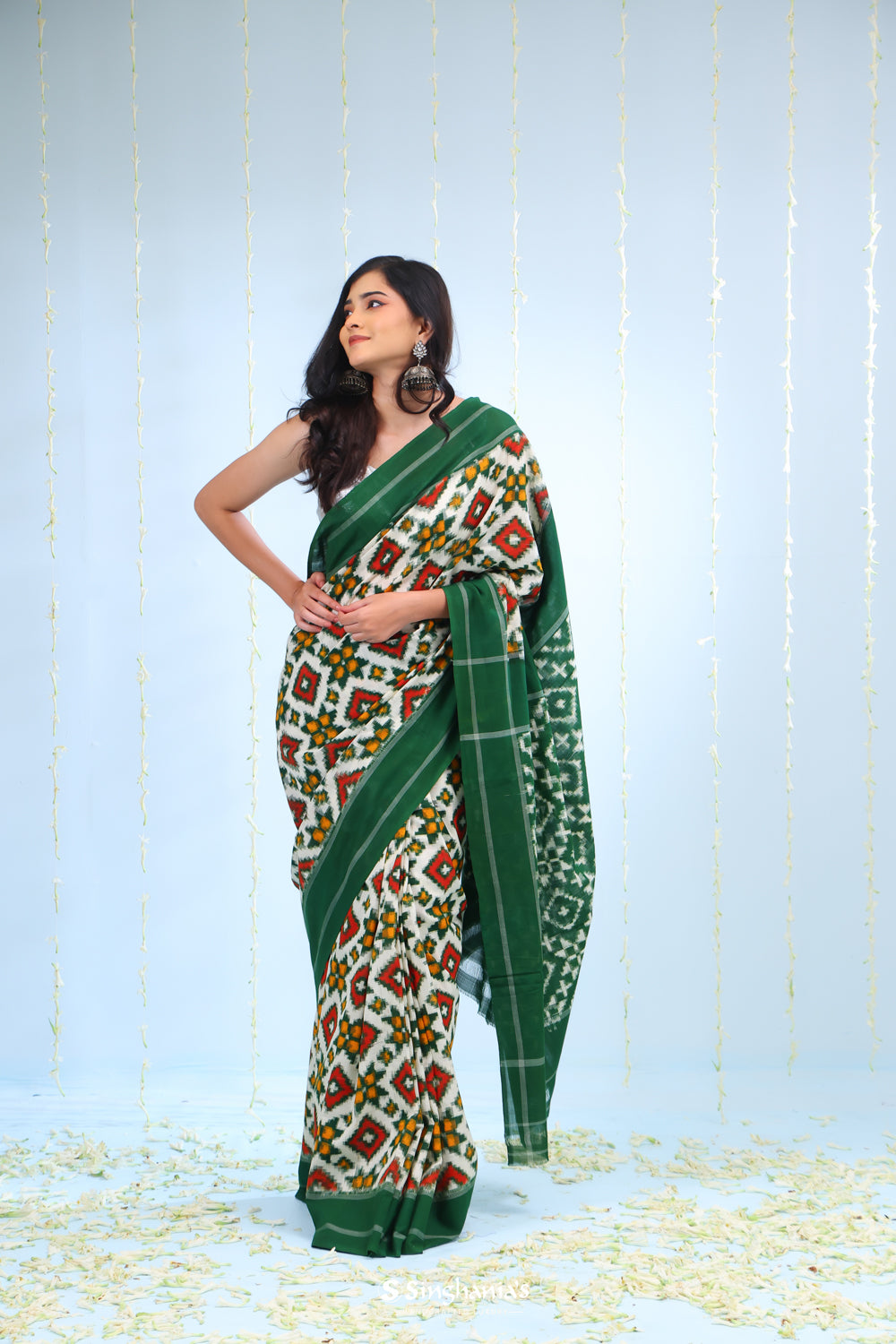 Ivory White Ikkat Cotton Saree With Green Border