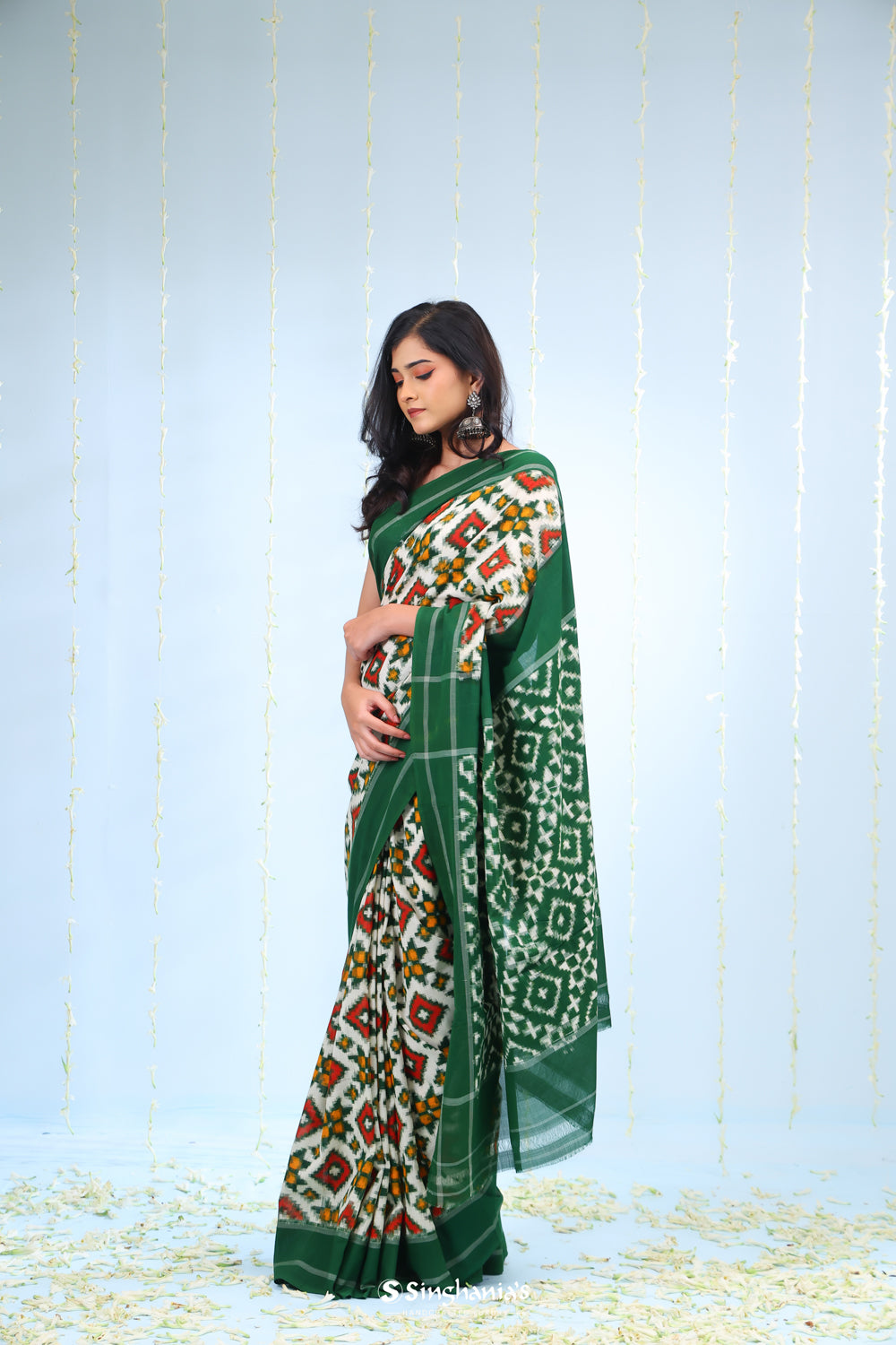 Ivory White Ikkat Cotton Saree With Green Border