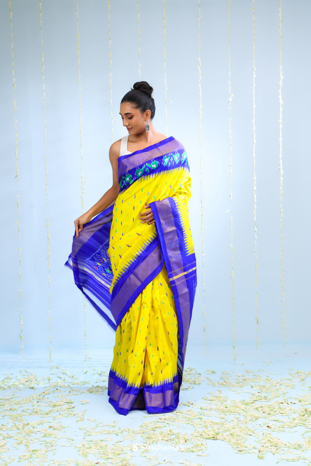 Bright Yellow Ikkat Patola Silk Saree With Contrast Border