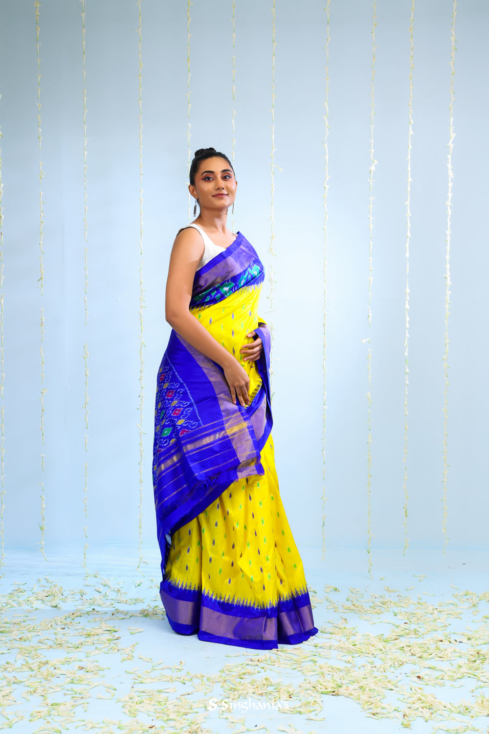 Bright Yellow Ikkat Patola Silk Saree With Contrast Border