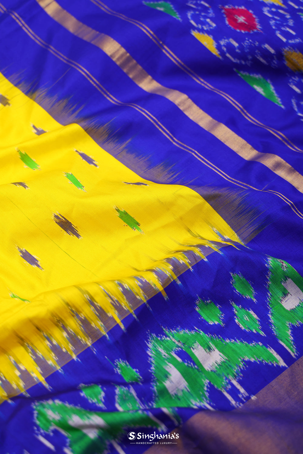 Bright Yellow Ikkat Patola Silk Saree With Contrast Border